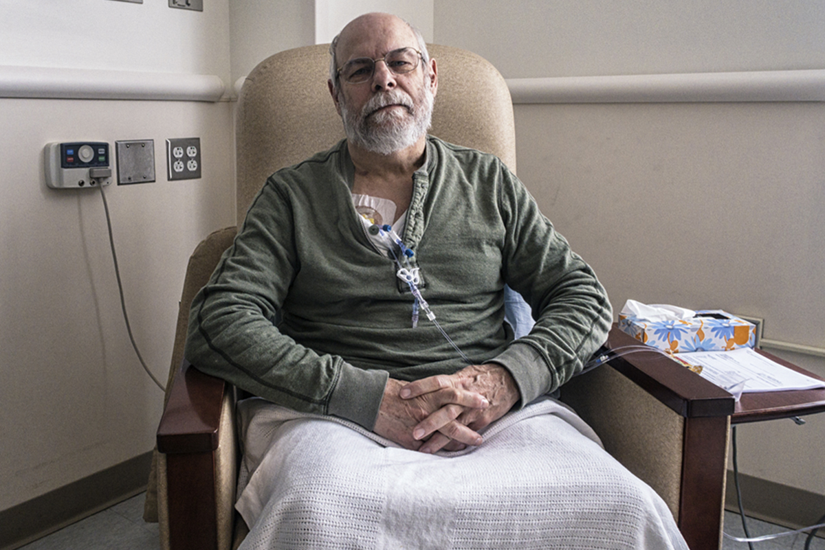 Senior Man Clinic Outpatient During Cancer Chemotherapy IV Infusion